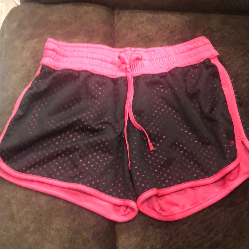 black and pink stretchy shorts